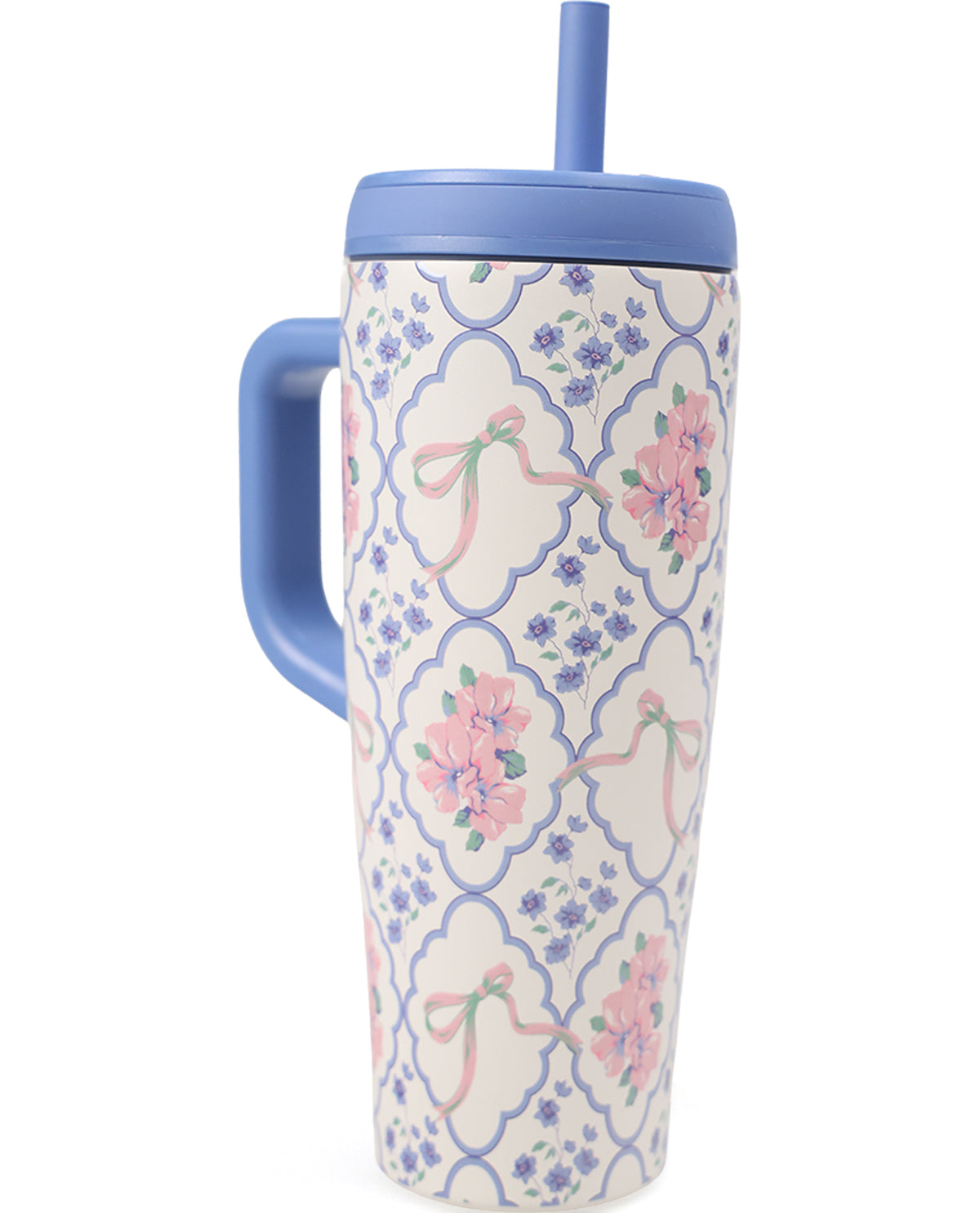 A tall insulated tumbler with a blue handle and blue lid, featuring a cream background with a blue trellis pattern and pink floral motifs, shown on a white background.