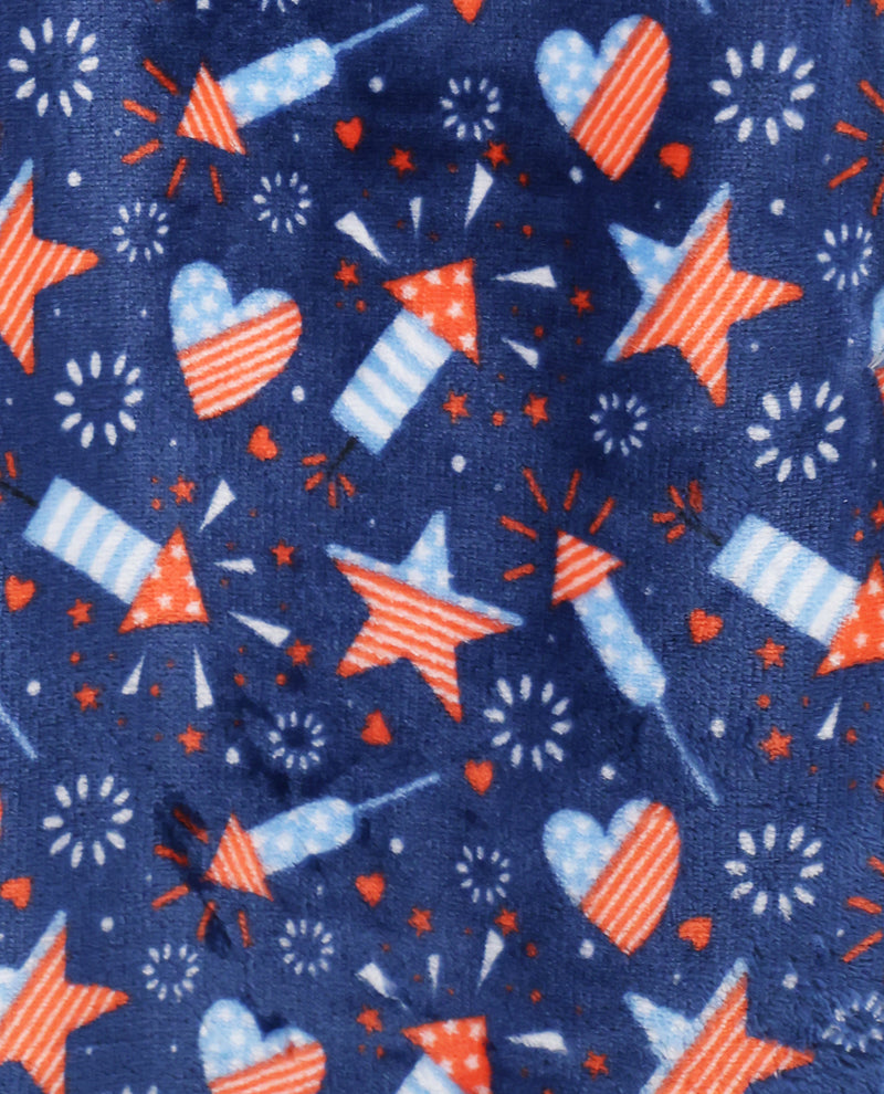 Festive fabric pattern with stars, hearts, and fireworks on a blue background