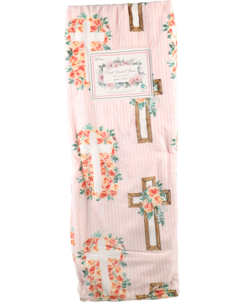 Floral cross design on a pink background with a label.