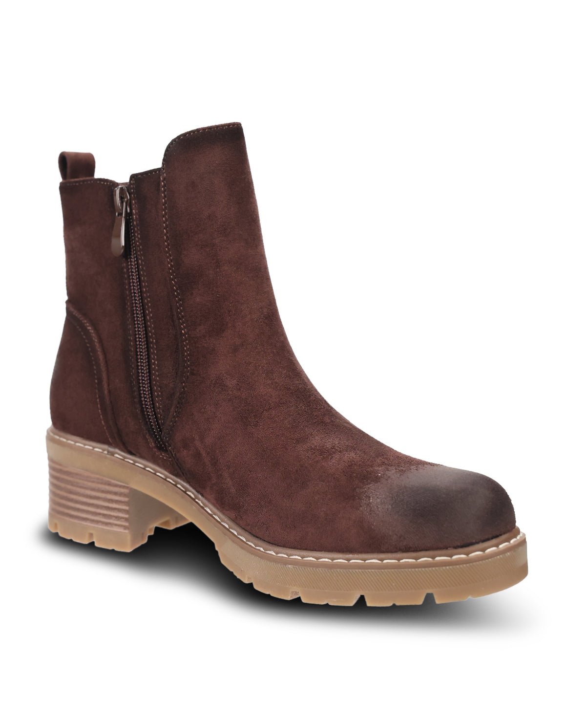 A dark brown suede ankle boot with a side zipper, a chunky stacked lug sole, and a light tan midsole, shown against a plain white background.
