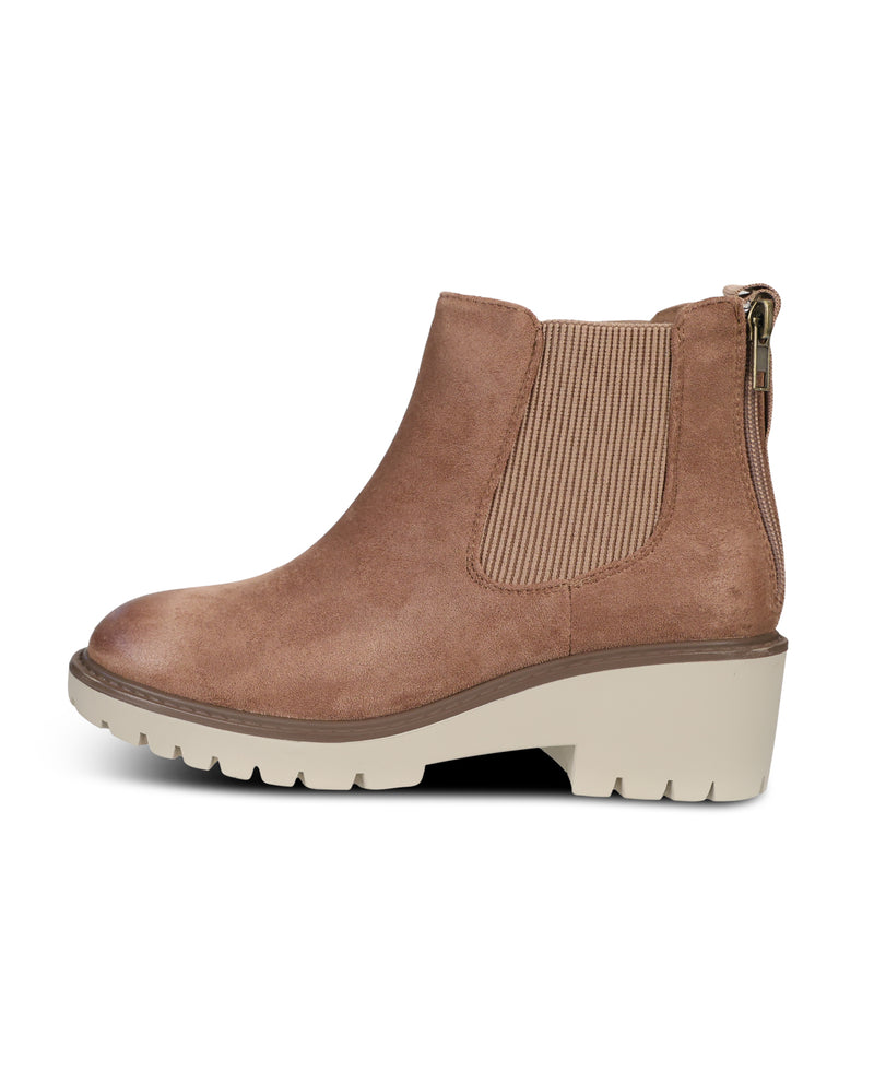 A single brown ankle boot with a ribbed elastic side panel and a chunky off-white sole, shown from a side profile on a white background.