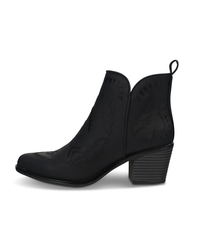 Black ankle boot on a white background