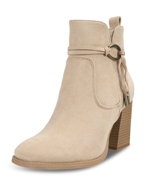 A beige suede ankle boot with a block heel, side strap detail with a metal ring, and a zip closure, shown against a plain white background.