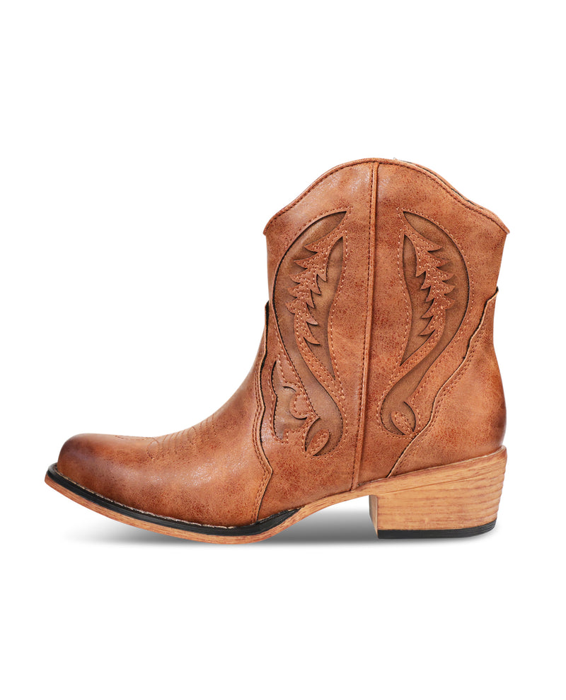 Brown cowboy boot with intricate designs on a white background