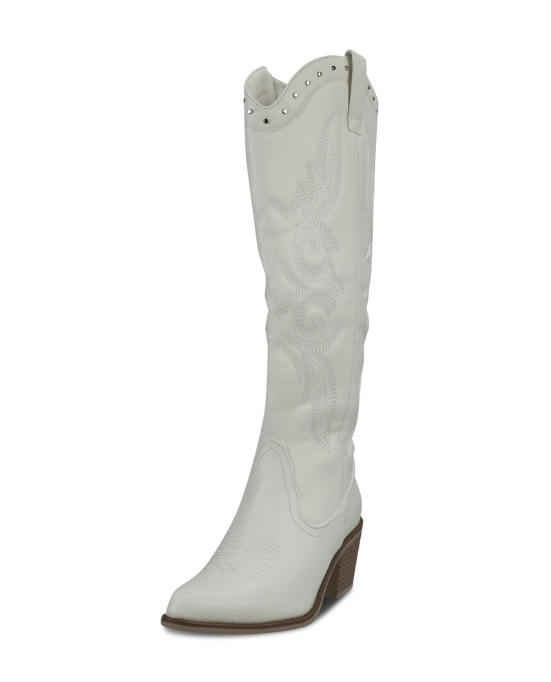 A single white leather knee-high cowboy boot with decorative stitching, silver studs, and a brown wedge heel, shown against a plain white background.