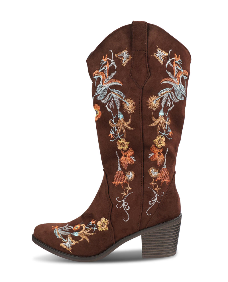 A brown suede cowboy boot with detailed floral embroidery in orange, blue, and white on the shaft and vamp, shown against a plain white background.