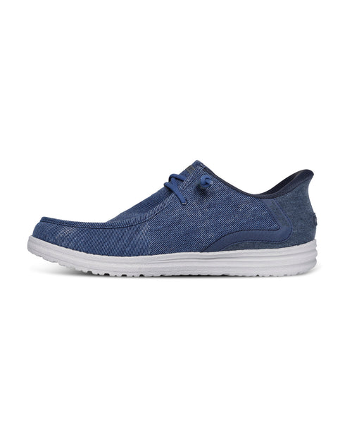 Denim shoe with a strap on a white background