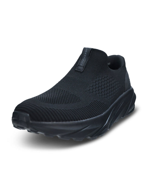 A single black slip-on athletic sneaker with a textured knit upper and chunky sole, shown from a three-quarters angle on a white background.