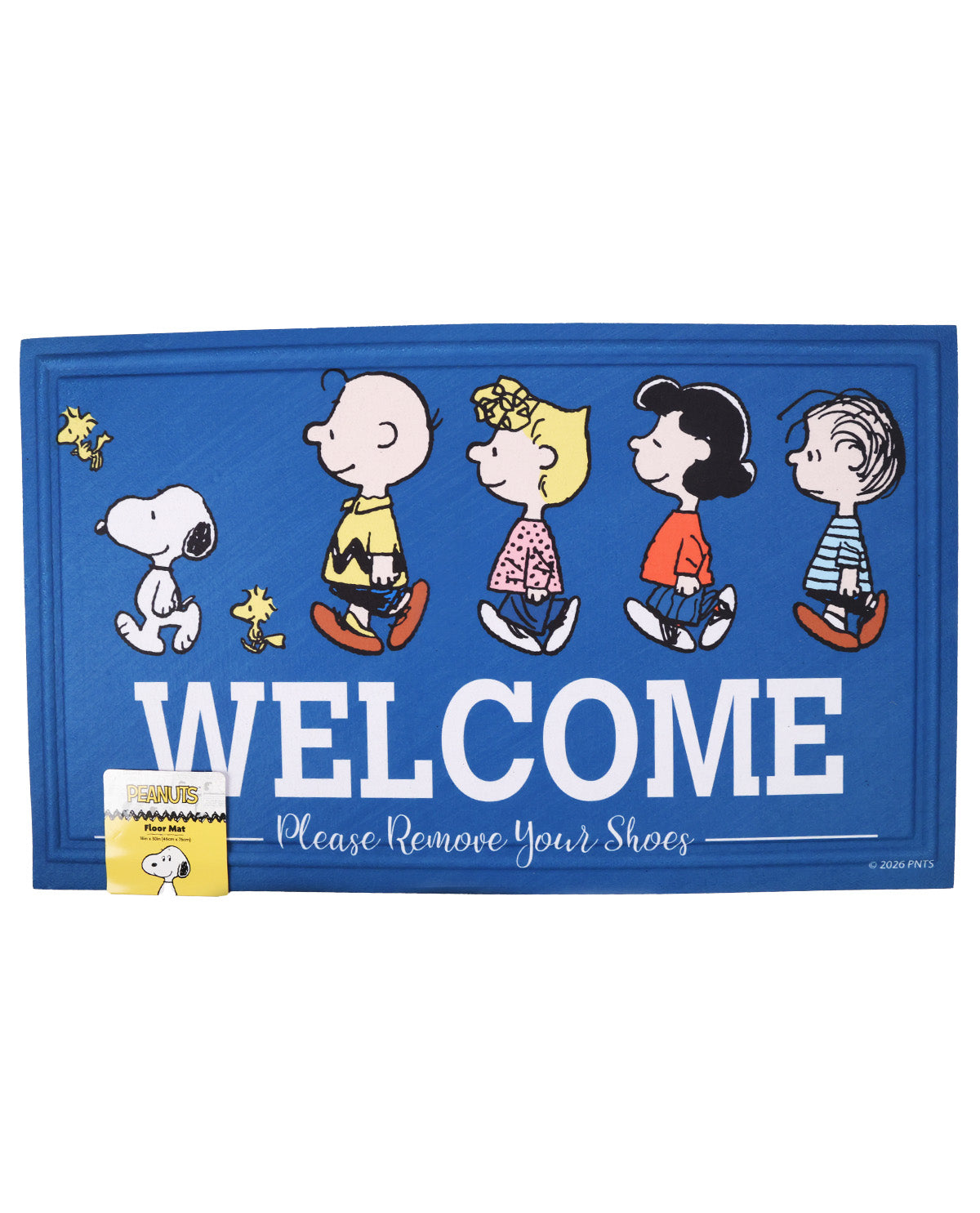 A blue rectangular doormat featuring the Peanuts characters Snoopy, Woodstock, Charlie Brown, Lucy, Sally, and Linus walking under the word 'WELCOME' in large white letters, with the phrase 'Please Remove Your Shoes' below. A small retail tag is attached to the lower left corner.