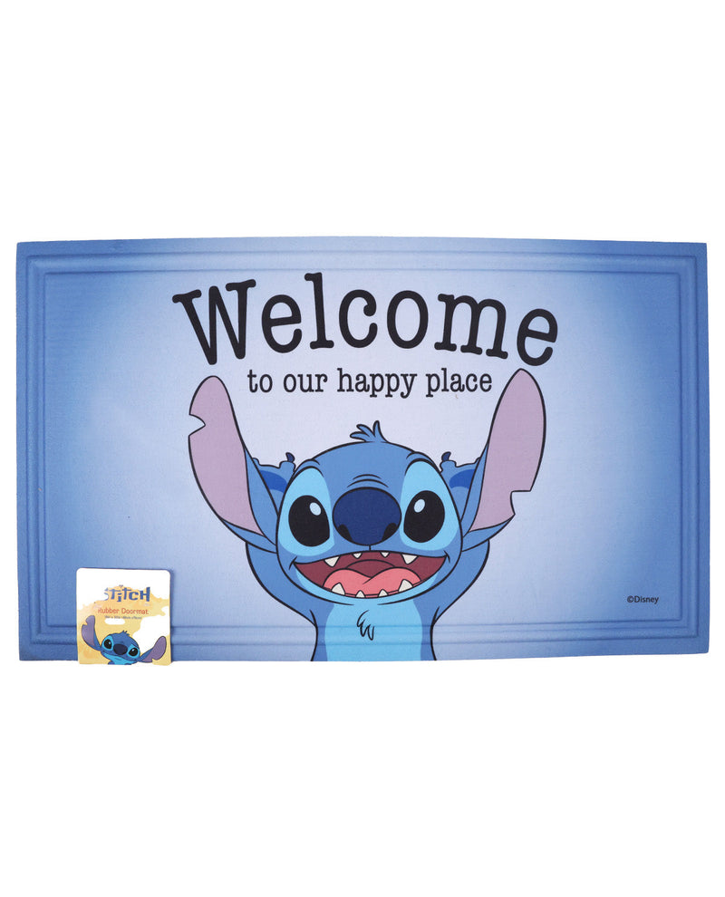 A rectangular blue mat featuring the character Stitch with the text 'Welcome to our happy place' in black lettering. A small Disney sticker is attached to the bottom left corner.
