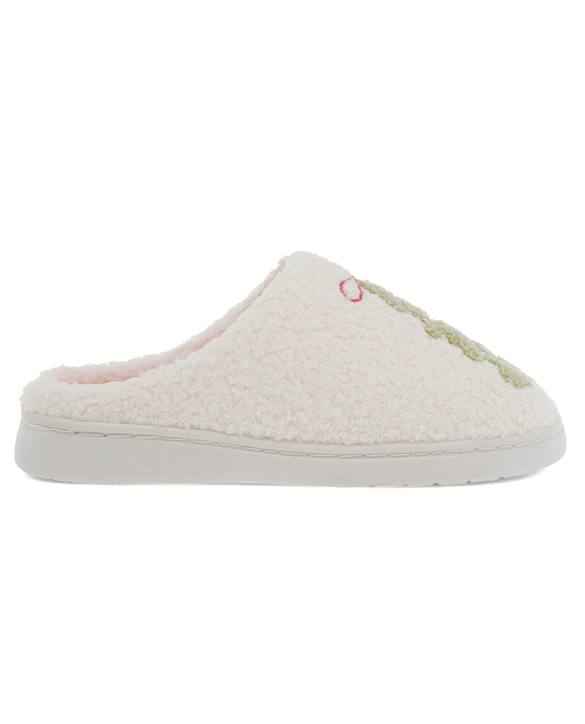A single slip-on mule slipper in a cream sherpa fabric with a white sole, featuring a small embroidered pink heart and green lettering on the side.