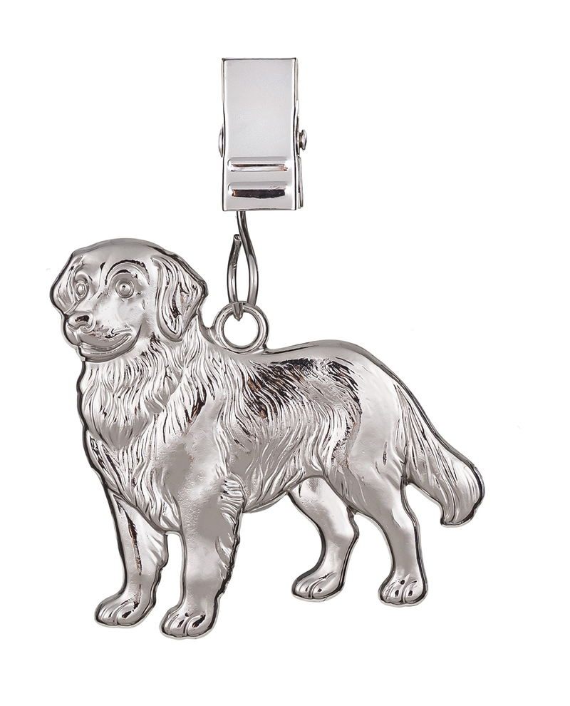 Silver dog charm on a white background