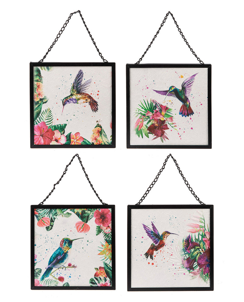 Set of four framed wall art prints featuring colorful watercolor-style hummingbirds and tropical flowers, arranged in a 2x2 grid on a white background.