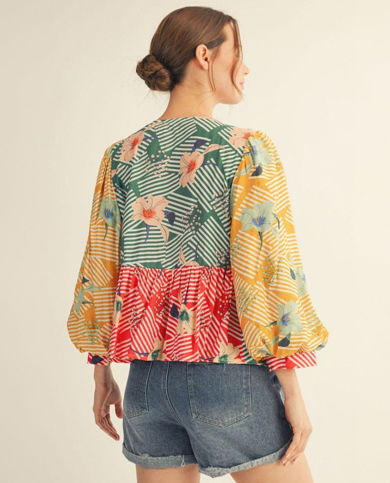 Jodifl 3/4 Puff Sleeve Color Blocked Floral Top With Front Bow Tie Detail