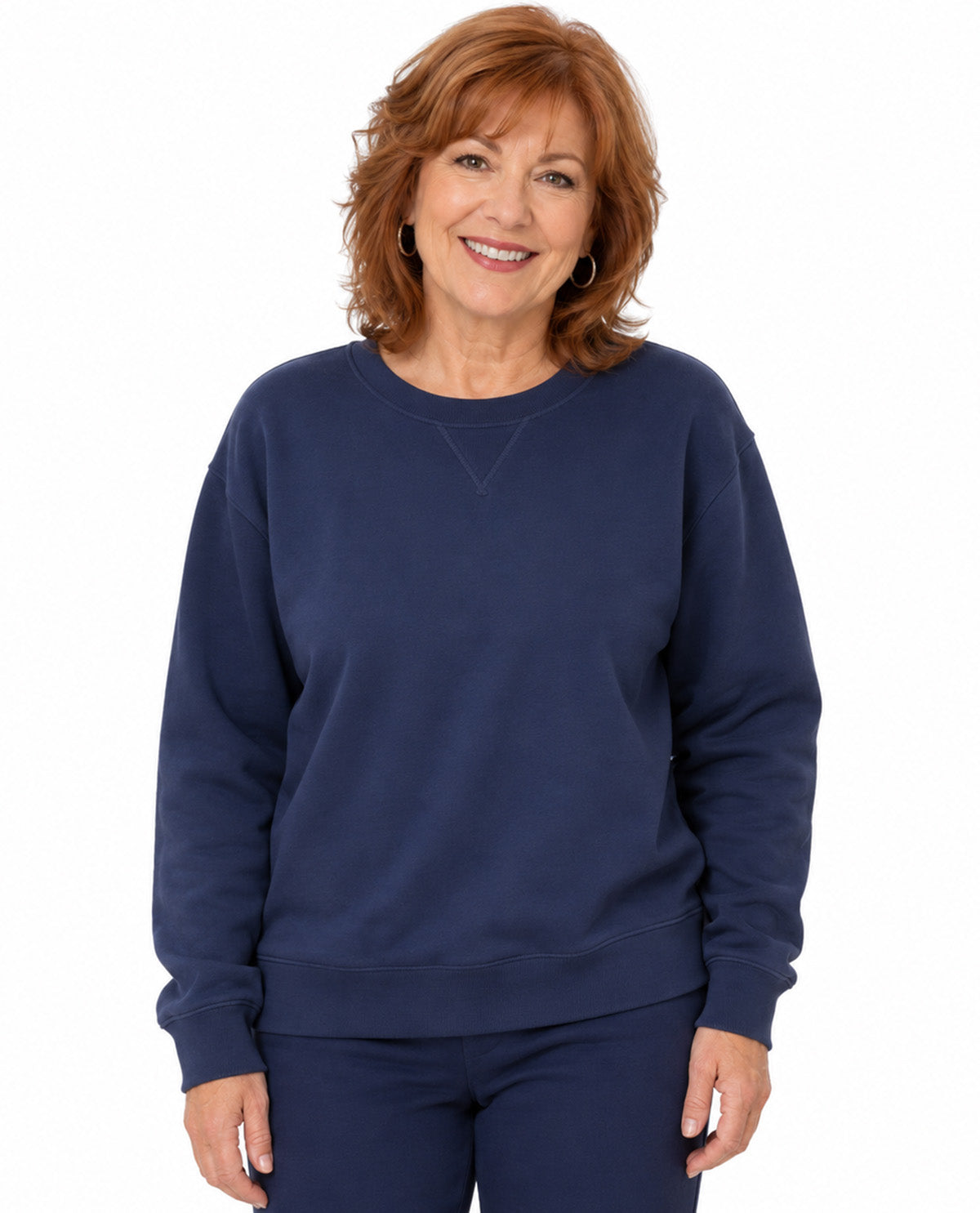 Model wearing a navy top with a white background