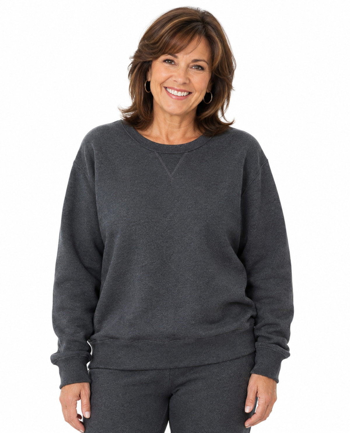 Model wearing a dark gray top with a white background