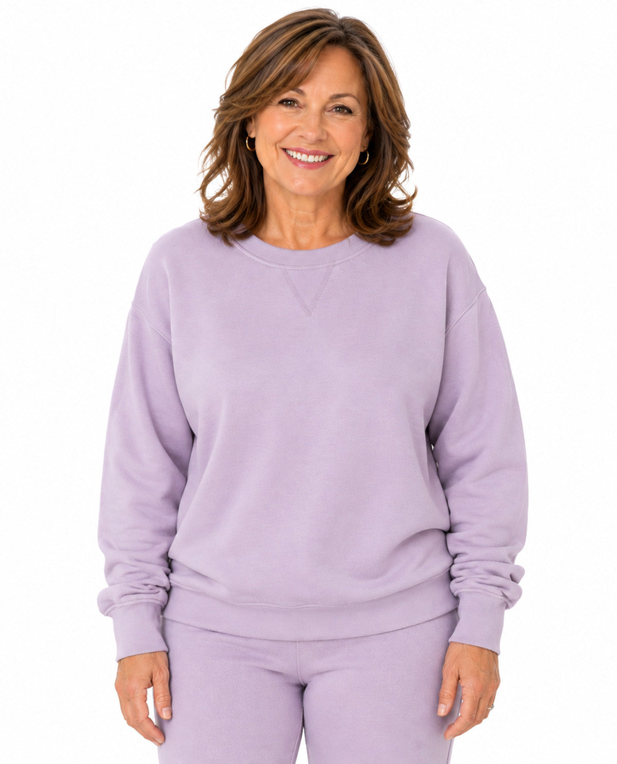 Model wearing a lt purple top with a white background