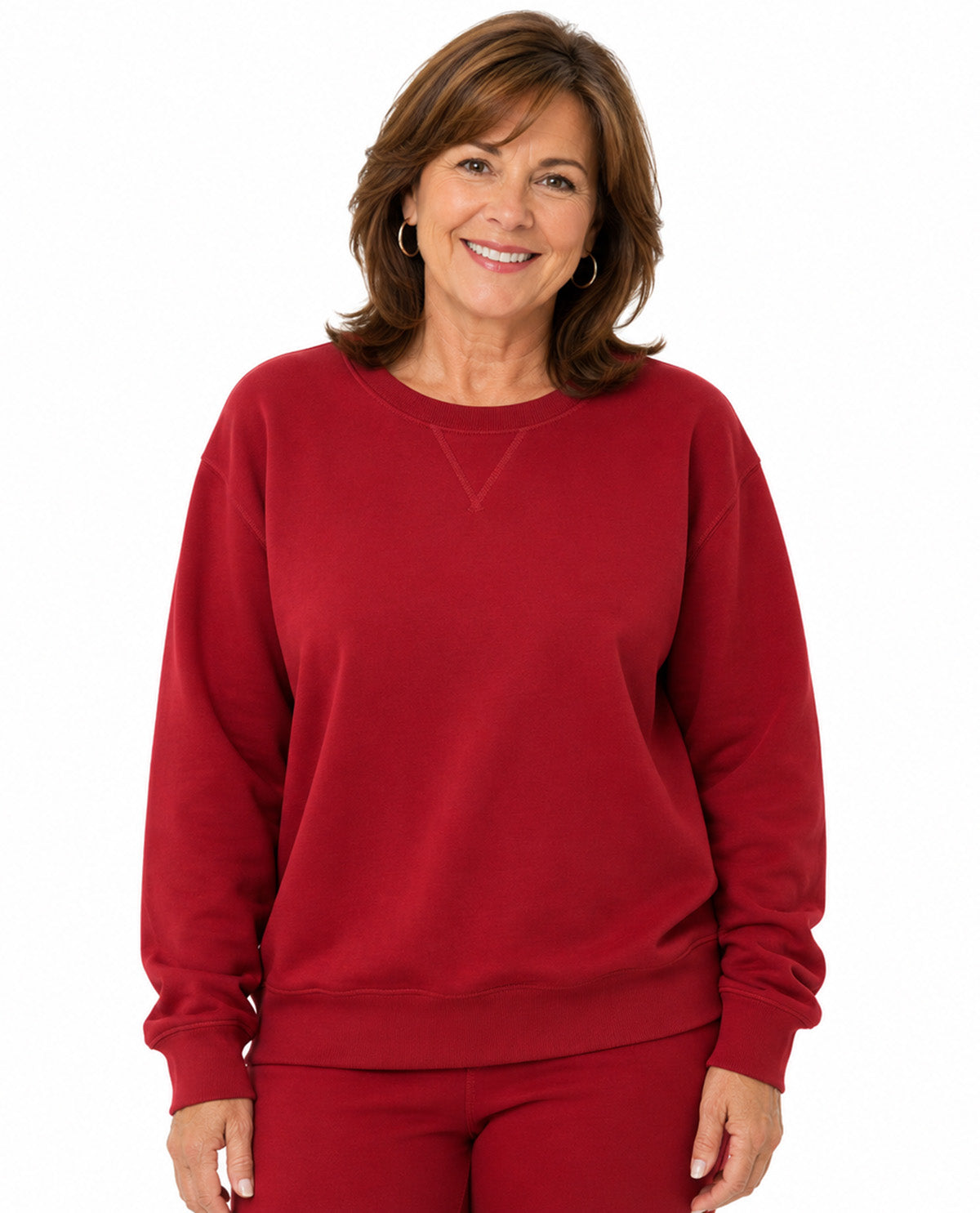 Model wearing a red top with a white background