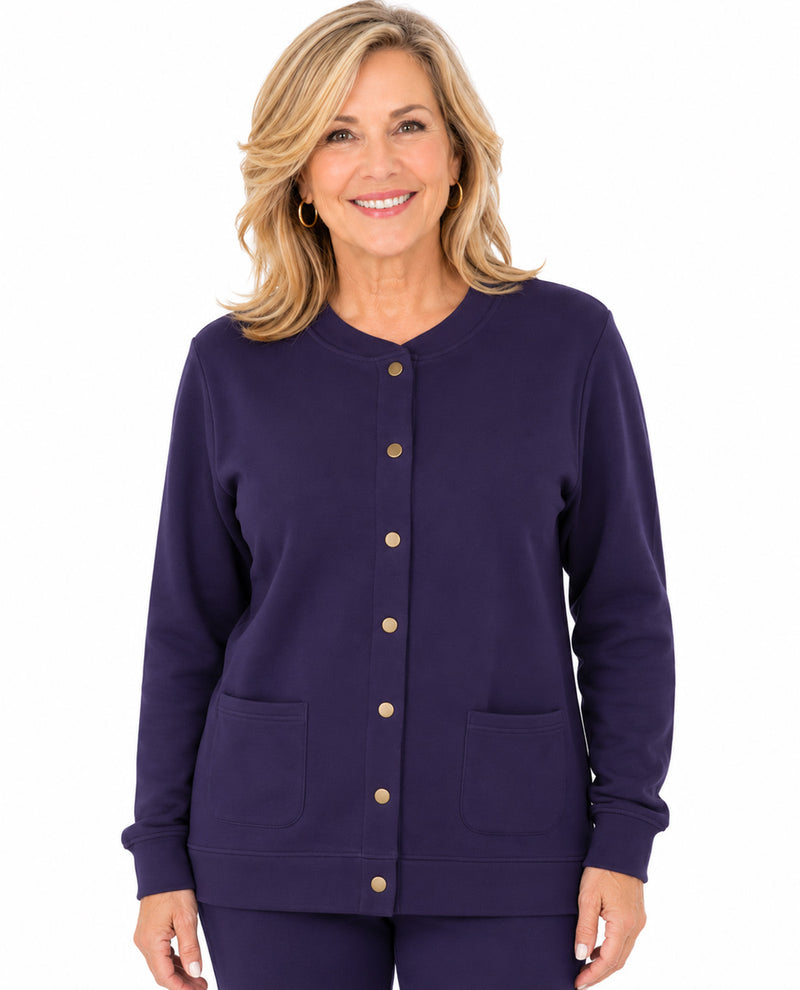 A smiling blonde woman wearing a dark purple long-sleeve button-front cardigan with two front patch pockets, shown against a plain white background.