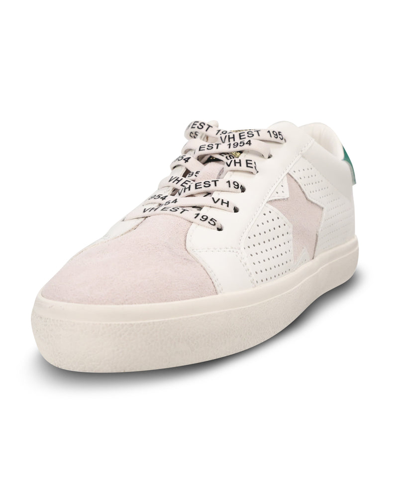 A low-top sneaker in white and pale pink suede, featuring a star-shaped side panel, perforated detailing, and chunky white laces printed with 'WEST 1957' text.