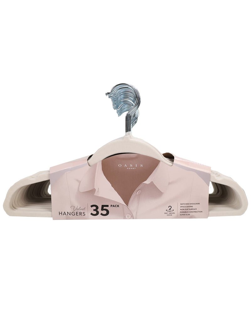 A pack of 35 Oakley Wood Hangers, shown with a light pink dress shirt folded inside the hanger packaging on a solid white background.