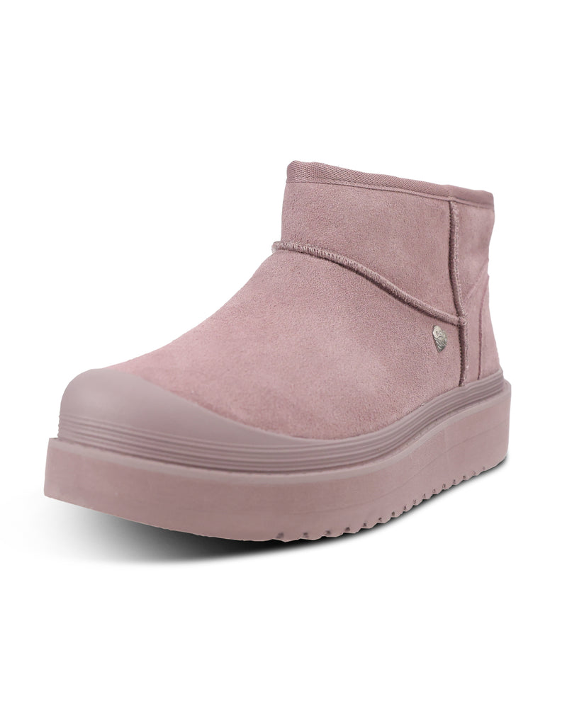 A single dusty pink suede ankle boot with a chunky platform sole, shown from a three-quarters angle on a white background.