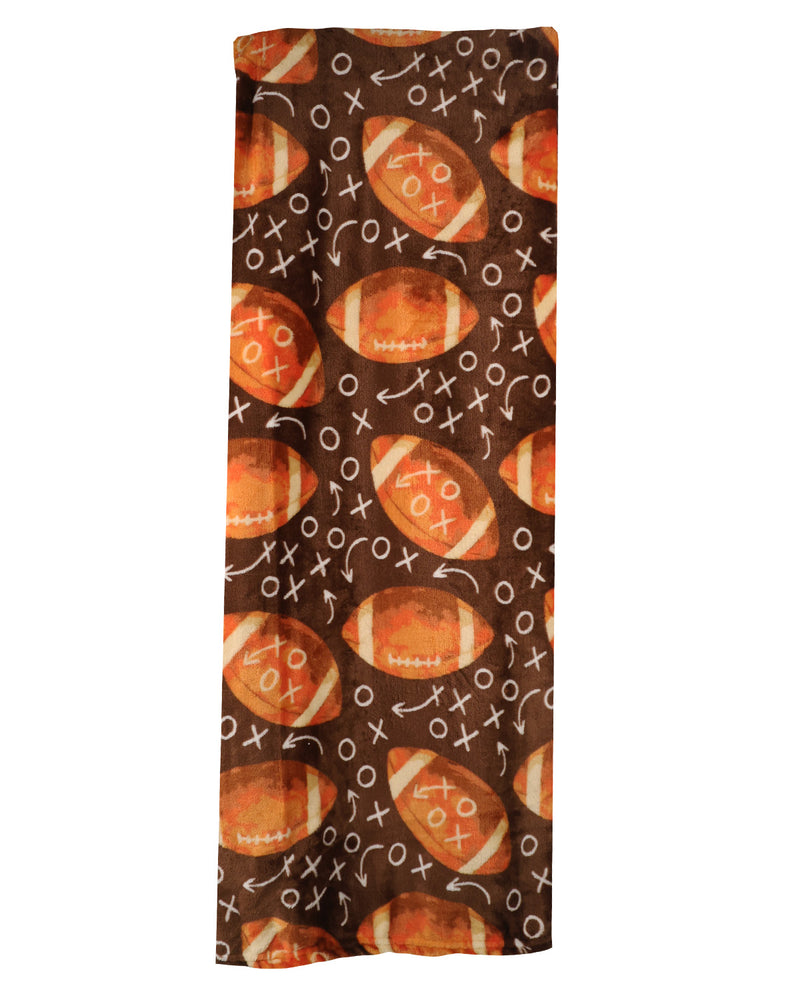 A long rectangular scarf or bandana featuring a repeating pattern of orange footballs and white tactical 'X' and 'O' marks on a dark brown background.
