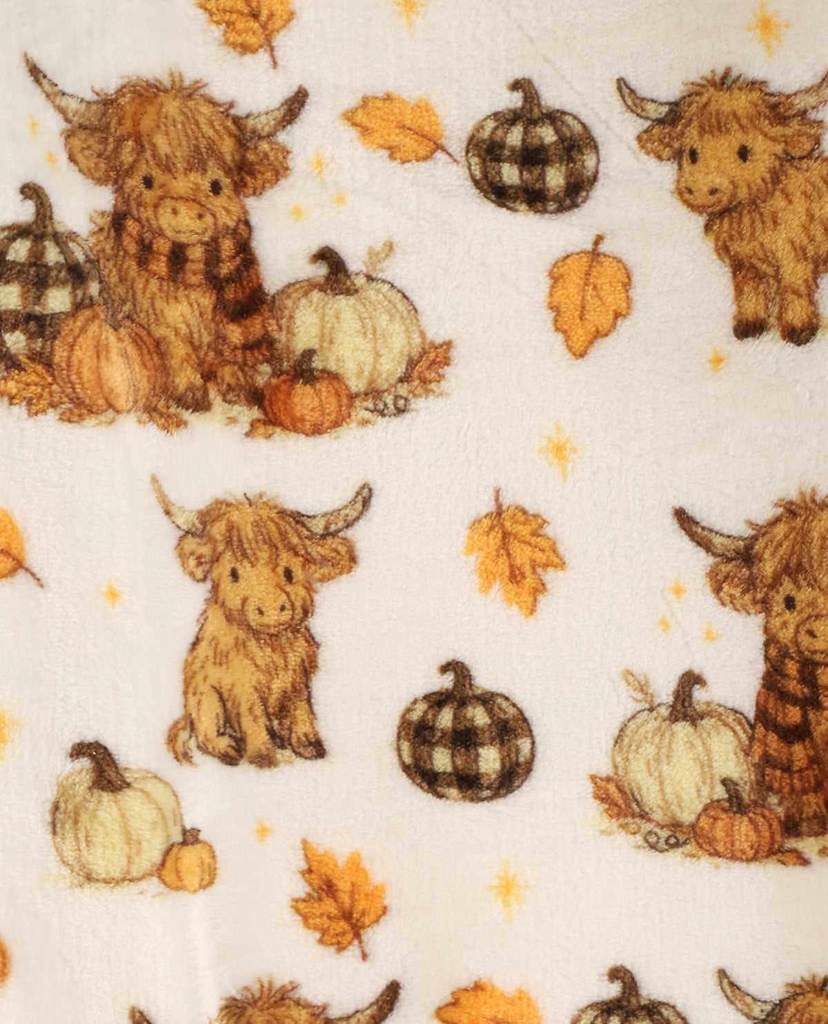 A close-up of a fabric featuring a repeating autumn pattern with Highland cows, pumpkins, plaid pumpkins, and yellow-orange leaves on an off-white background.