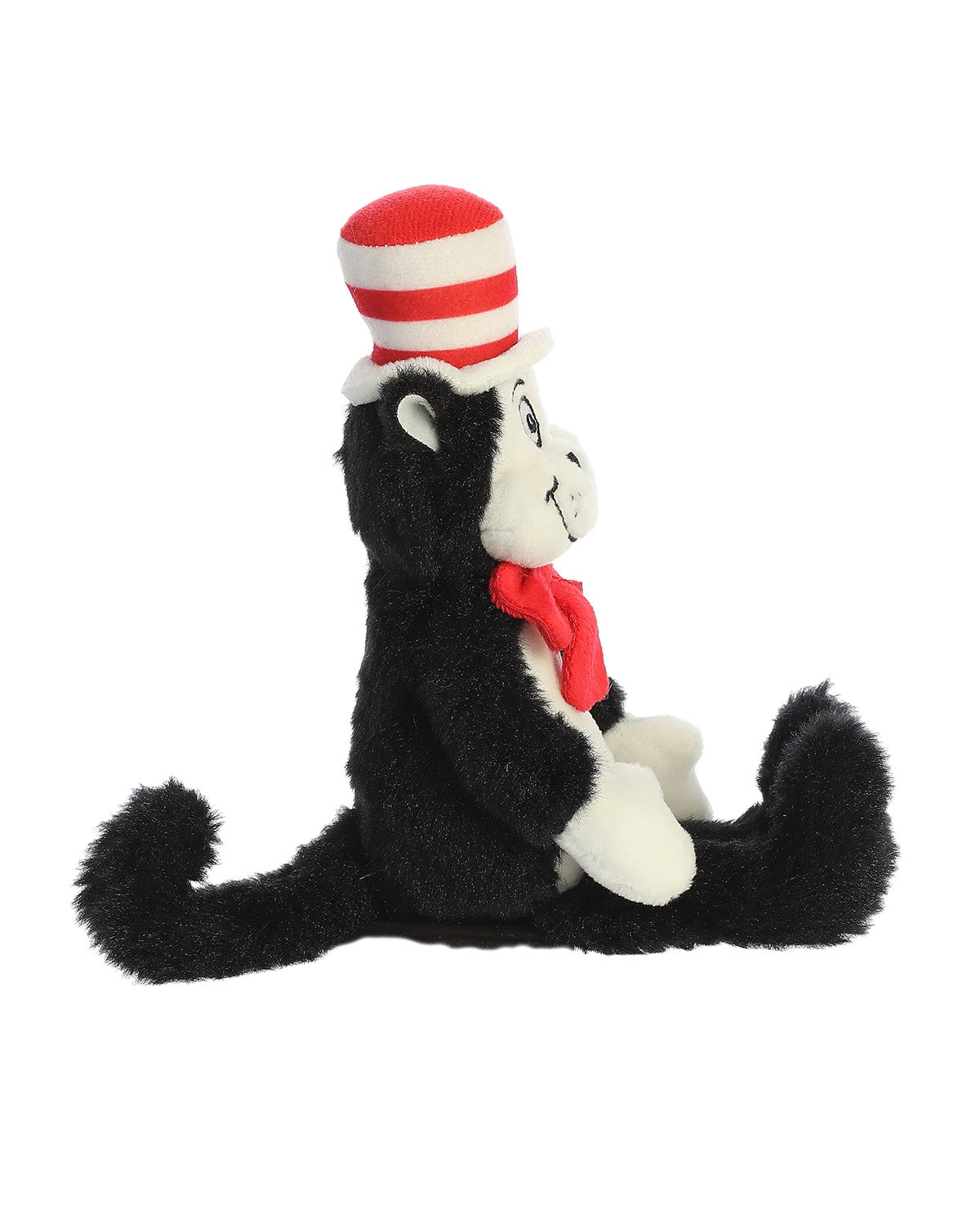 A plush monkey toy wearing a red and white striped hat and a red bow tie, posed against a plain white background.