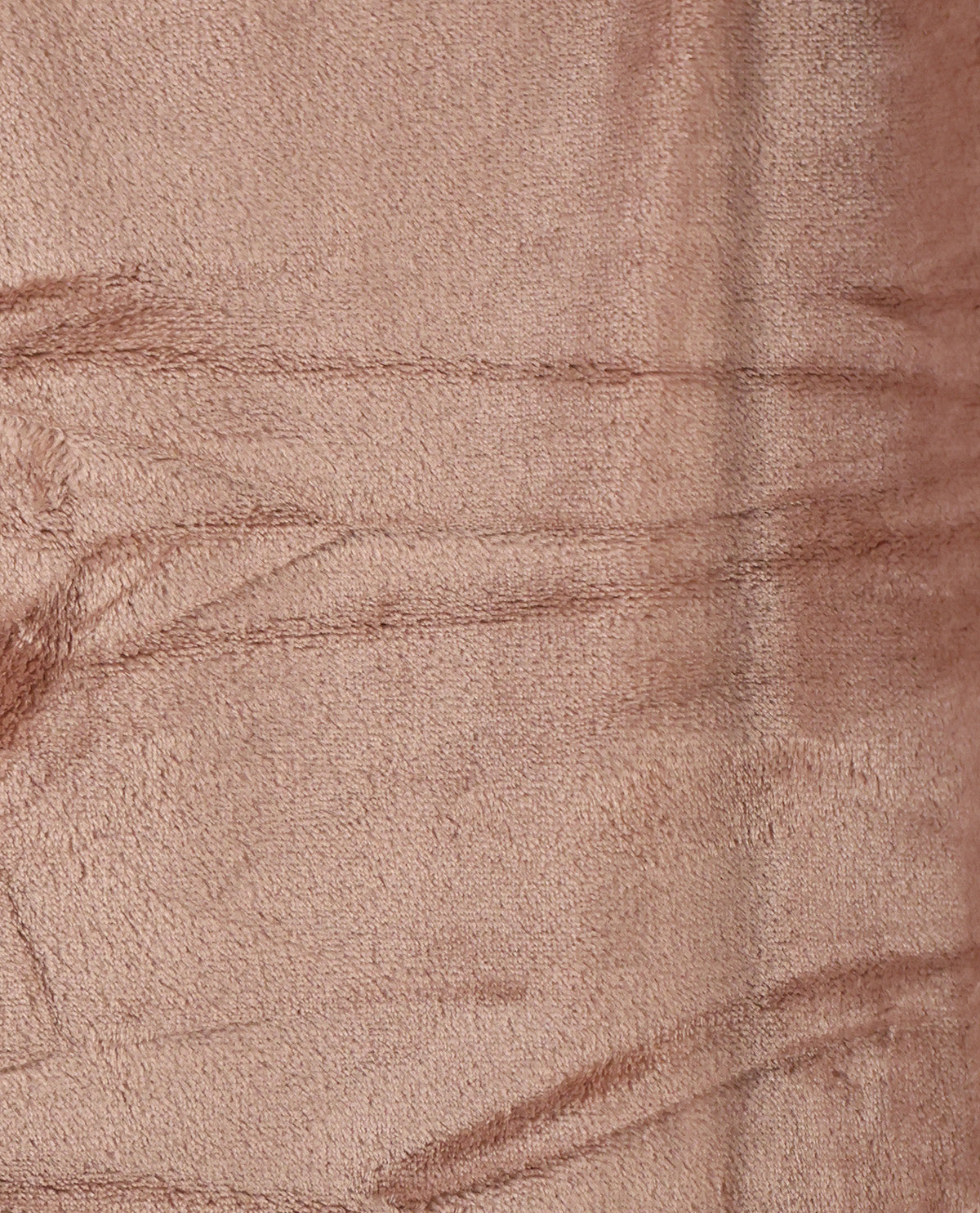 A close-up of a soft, plush fabric texture in a dusty rose or mauve color, showing the fine woven fibers and subtle tonal variations.