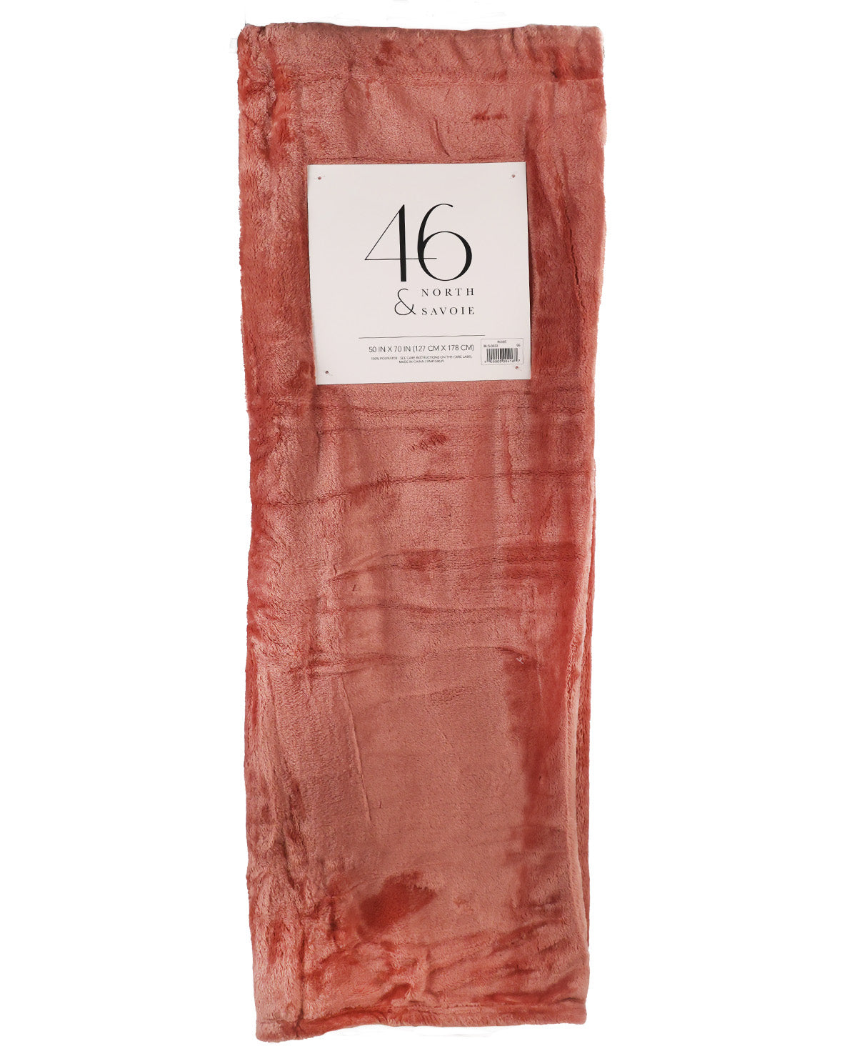 A folded piece of dusty rose pink sheer mesh fabric with a white paper label that reads '46 C NORTH & SAVOIE'.