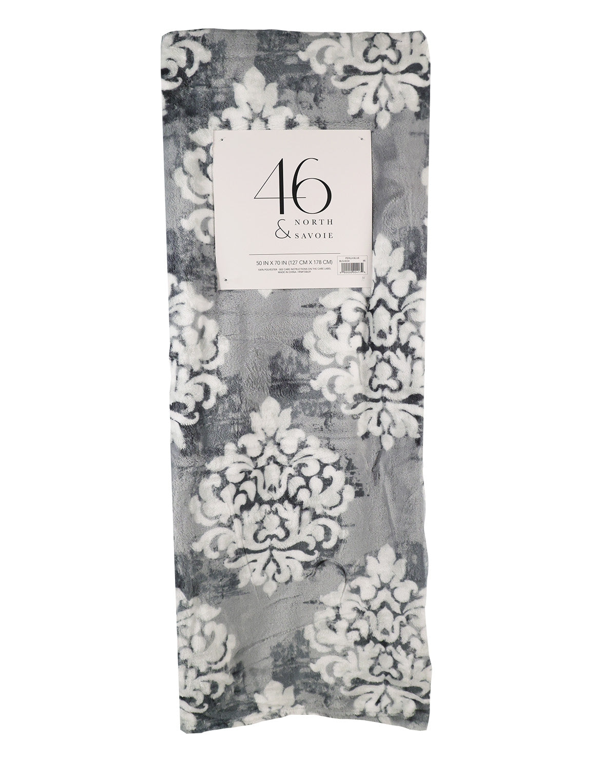 A folded throw blanket with a gray and white damask floral pattern, featuring a white paper label that reads '46 NORTH & SOUTH' at the top center.