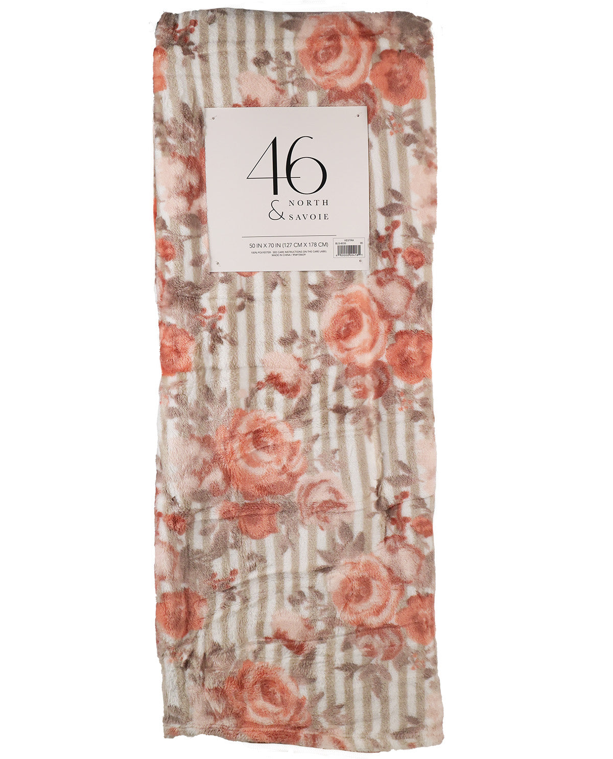 A folded cotton blanket with a floral rose pattern over a beige and white striped background, featuring a white paper label that reads '46 & North & Savois'.