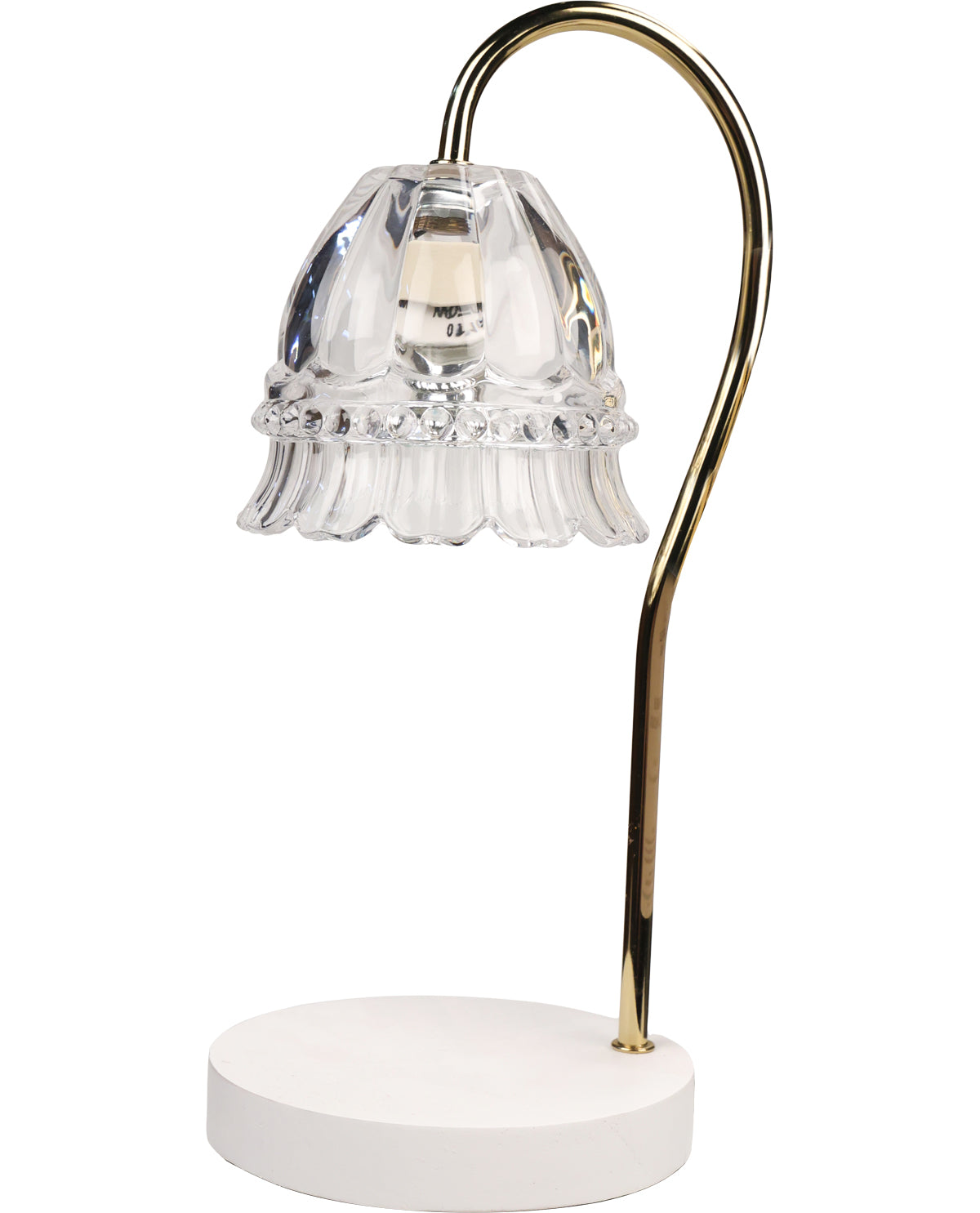 Decorative table lamp with clear glass shade and gold arm on a white background