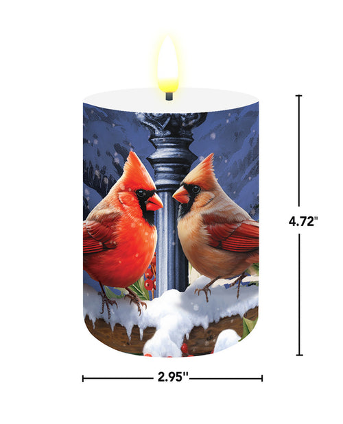 Candle with a design of two cardinals on a snowy background, with measurements indicated.