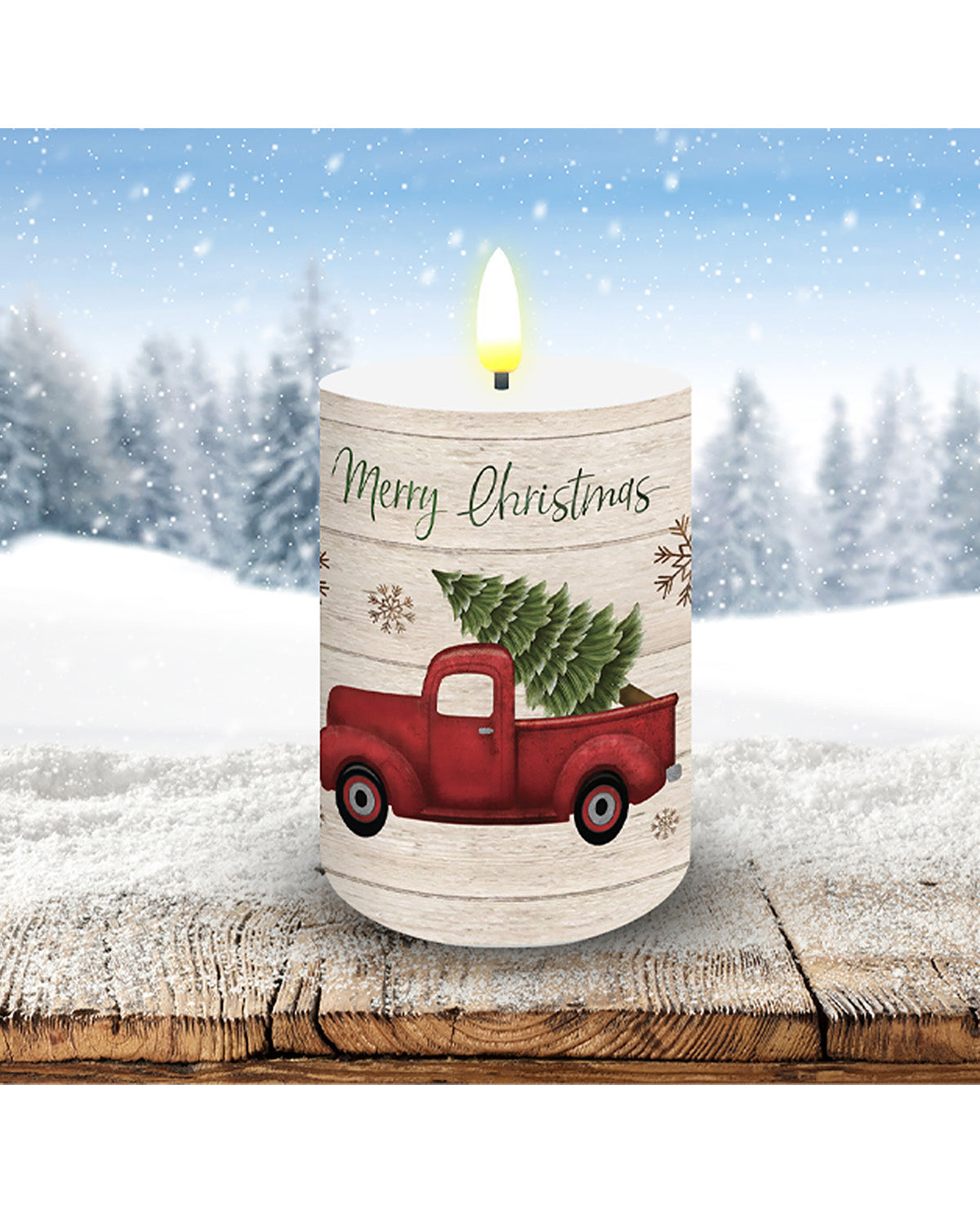 Candle with a Christmas design featuring a red truck and tree, set against a snowy landscape.