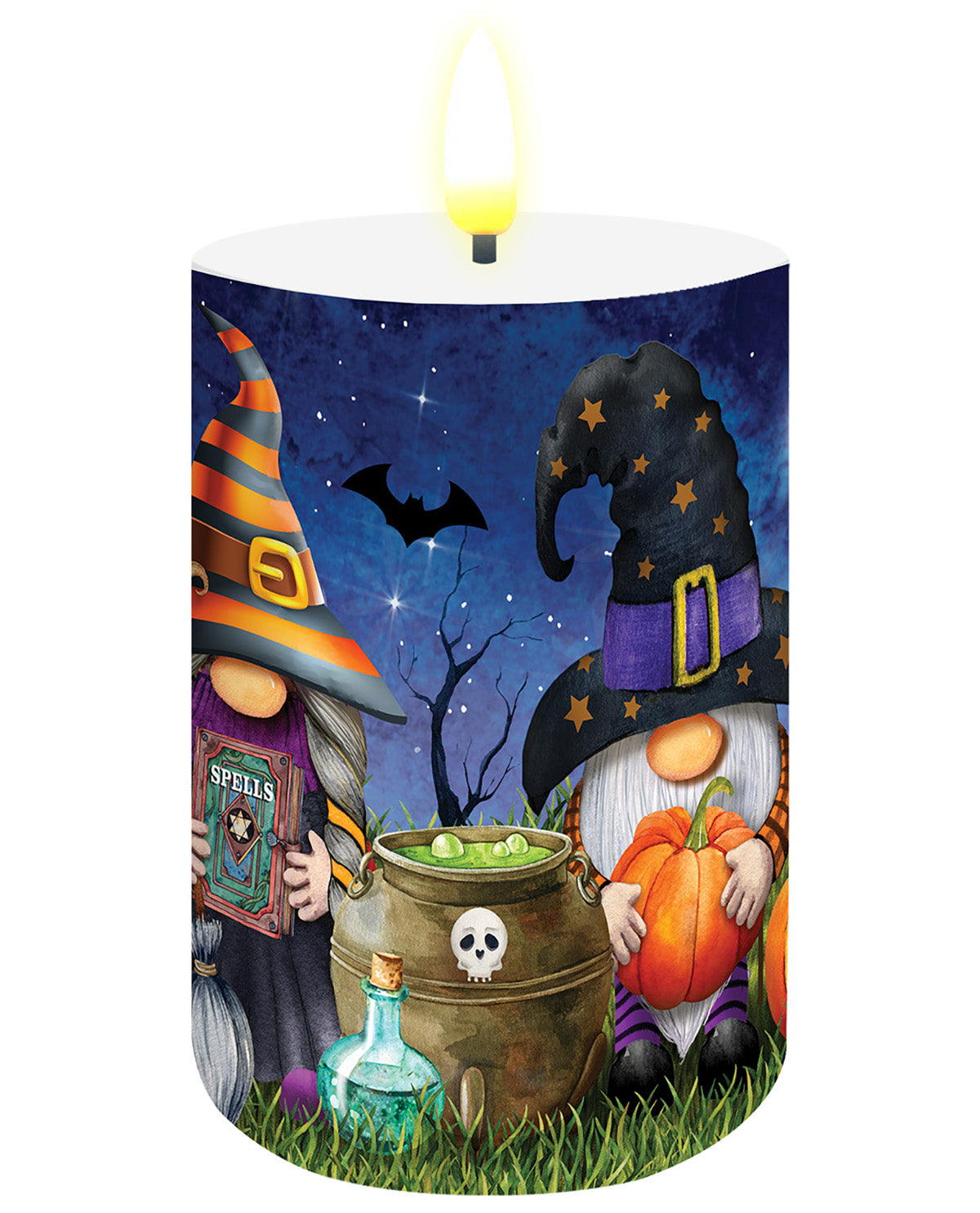 A lit white pillar candle featuring a colorful Halloween illustration with two witch gnomes, a cauldron, a pumpkin, stars, and a bat on a dark blue night sky background.