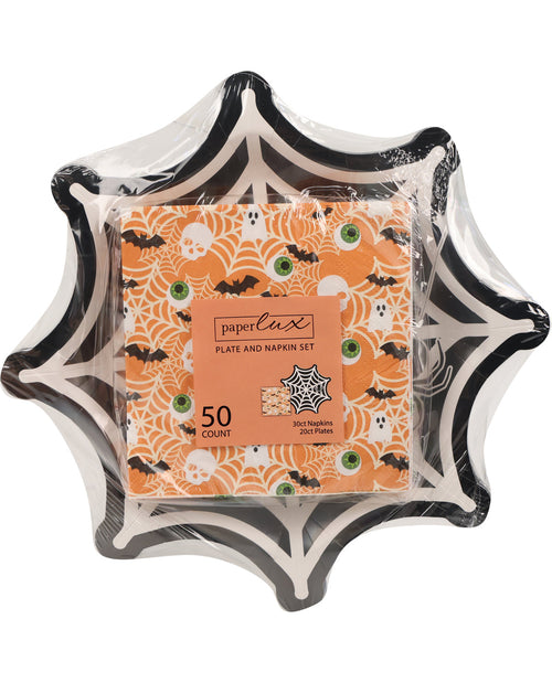 A Halloween-themed paper plate and napkin set by PaperLax, featuring a black and white spiderweb plate with orange, black, and green spiderweb and spider-patterned napkins inside a clear plastic wrapper.