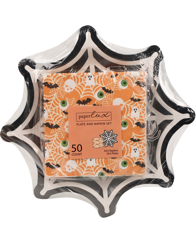 A Halloween-themed paper plate and napkin set by PaperLax, featuring a black and white spiderweb plate with orange, black, and green spiderweb and spider-patterned napkins inside a clear plastic wrapper.