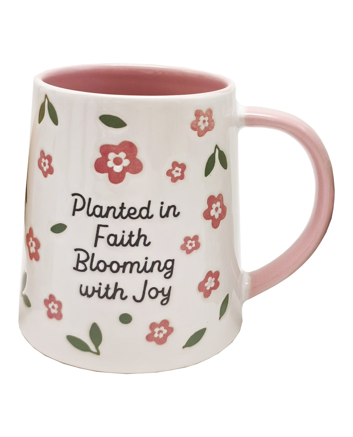 A white ceramic coffee mug with a pink handle and interior, decorated with a pattern of pink flowers and green leaves, featuring the text 'Planted in Faith Blooming with Joy' in black script.