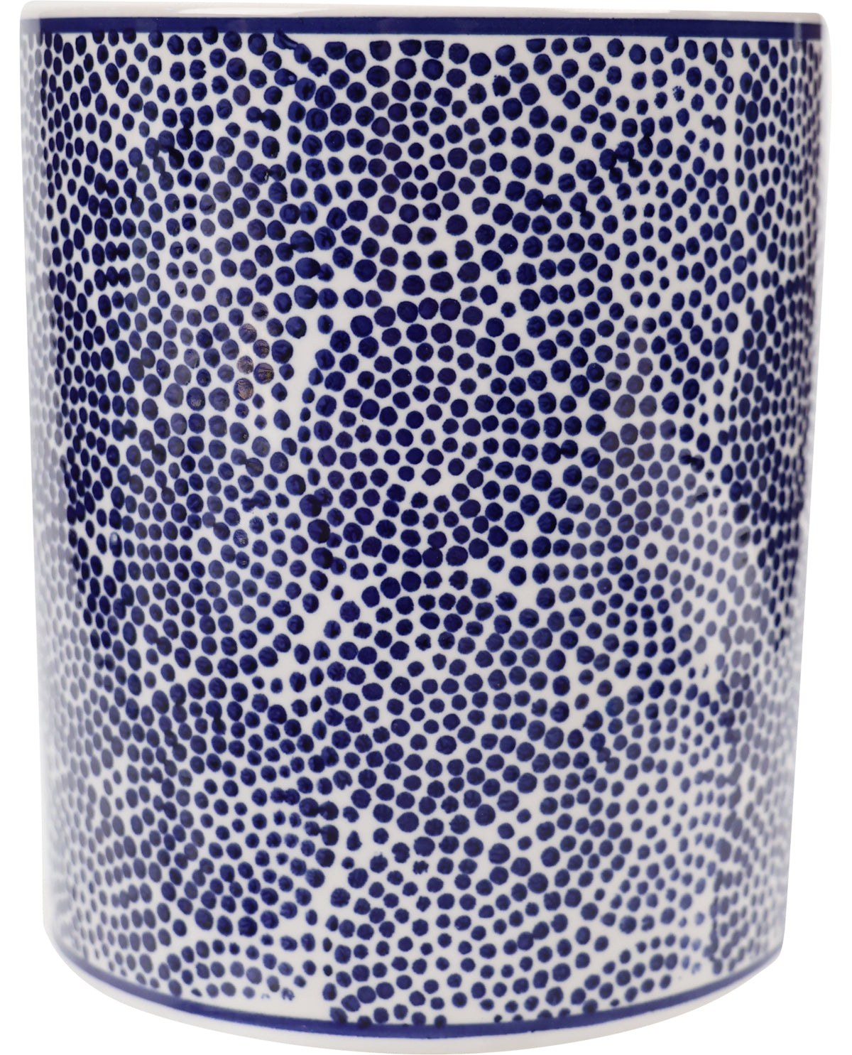 Ceramic jar with blue dot pattern on a white background