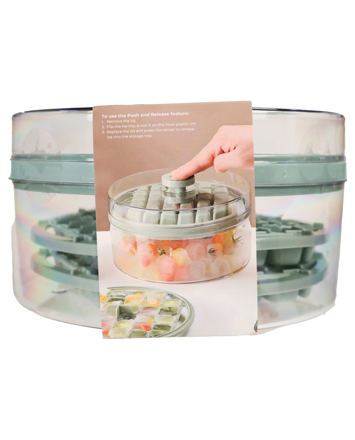 A clear plastic multi-tier fruit/vegetable saver with a translucent gray lid and handle, shown with an instructional card in front. A hand is pictured on the card demonstrating how to use the push-button lid mechanism.
