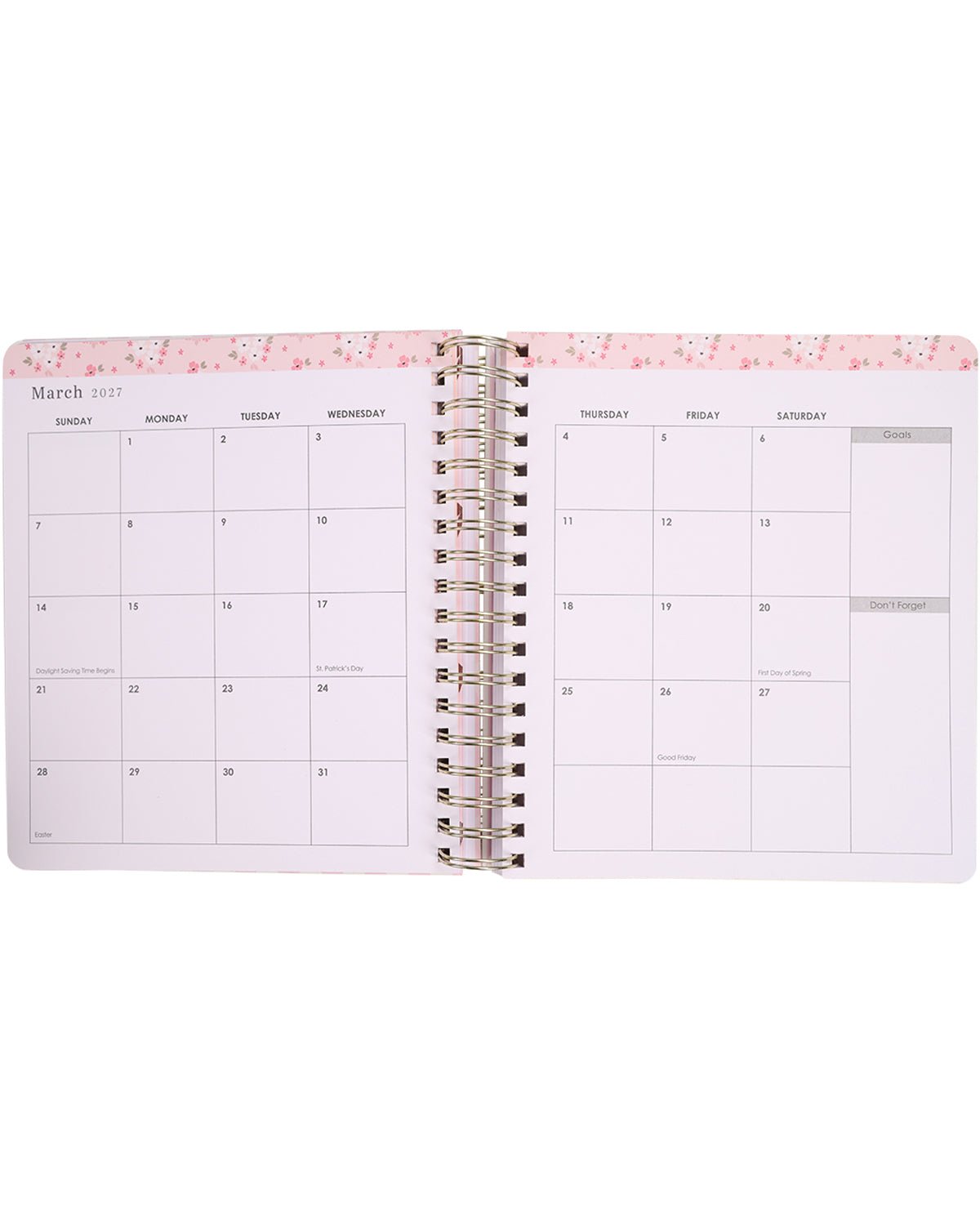 Open spiral-bound planner with a pink floral design on a white background