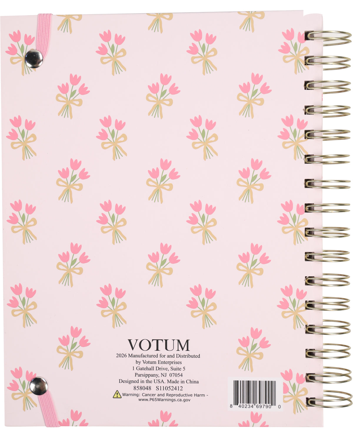 Notebook with floral design and 'Votum' branding on a pink background