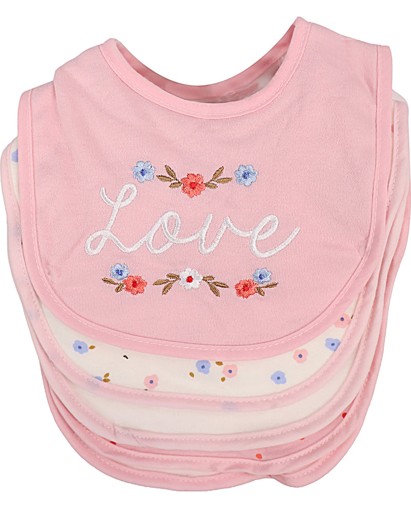 A stack of baby bibs in light pink, with the top bib featuring white embroidered script spelling 'Love' surrounded by small red, blue, and white flowers with green stems.