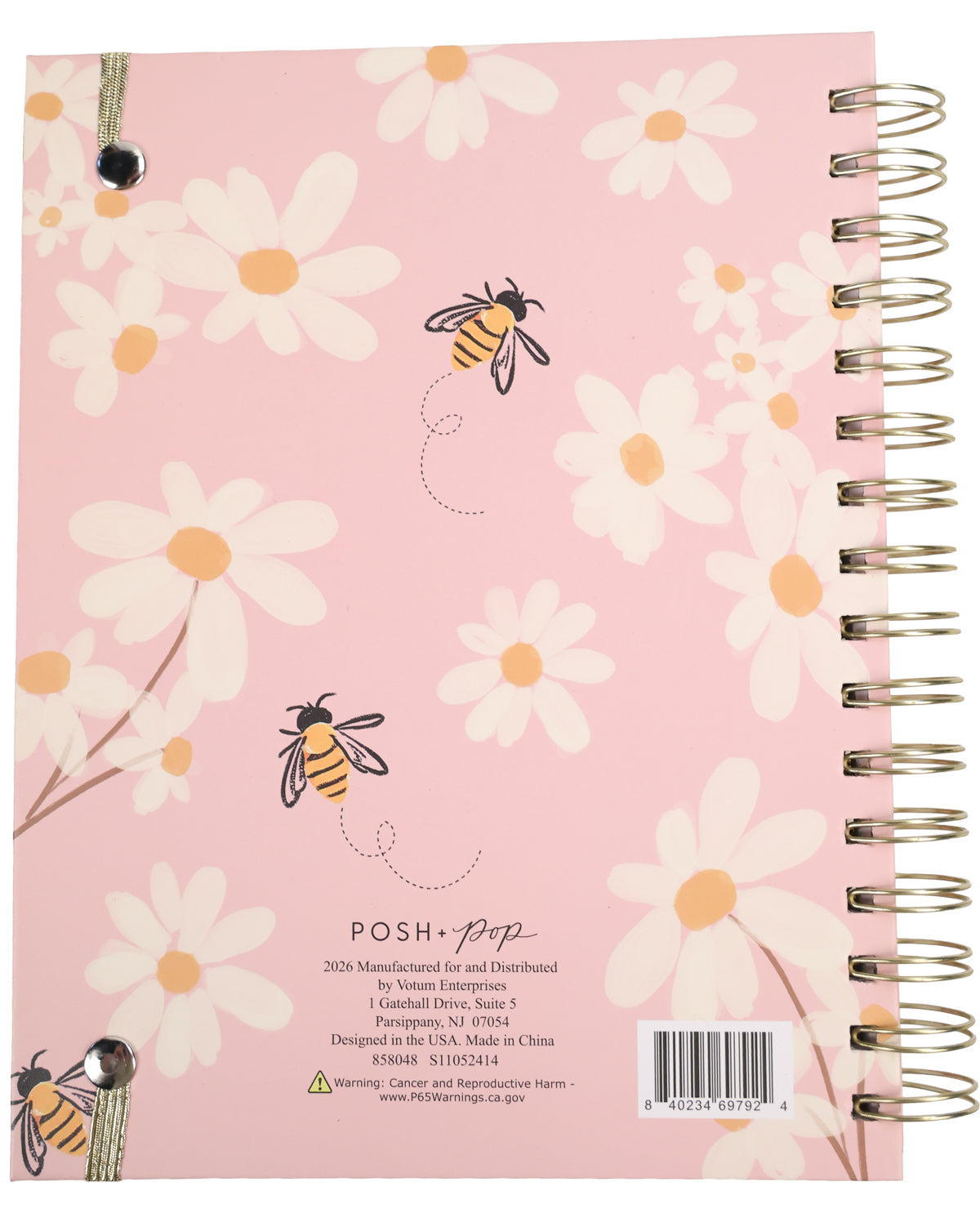 Notebook with floral design and bees on a pink background