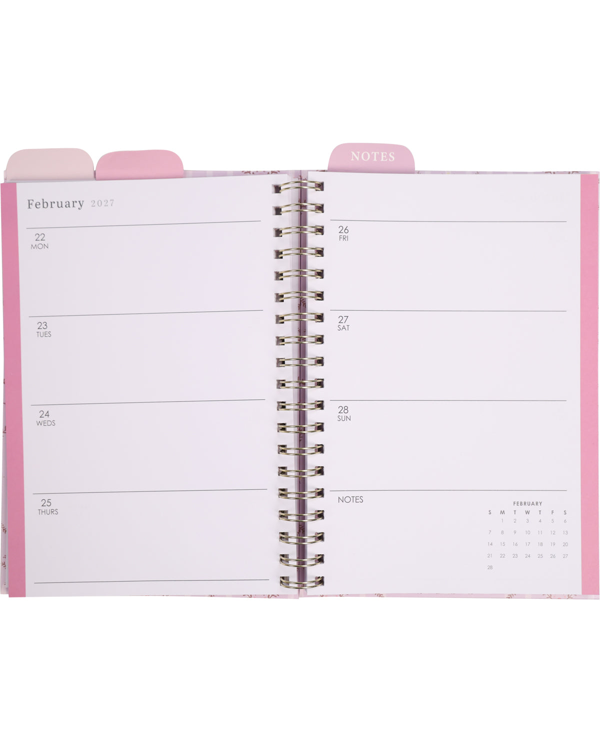 Open planner with pink cover and interior pages on a white background
