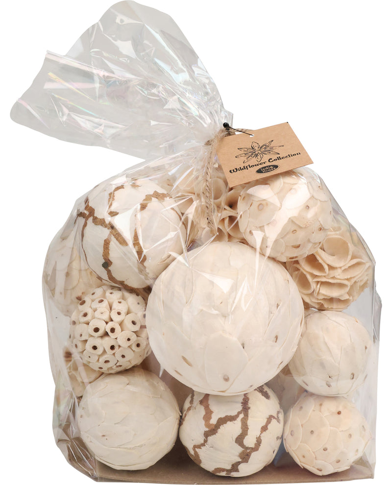 Bag of bath bombs with a visible brand tag on a white background