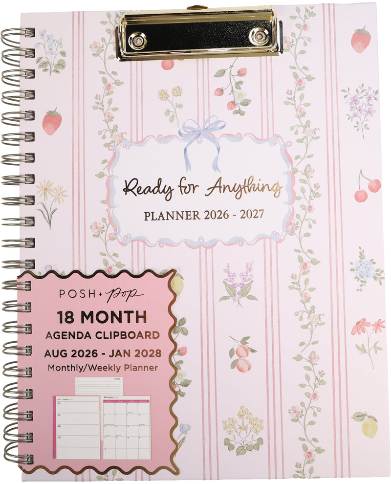 Planner with floral design and 'Ready for Anything' text on a pink background