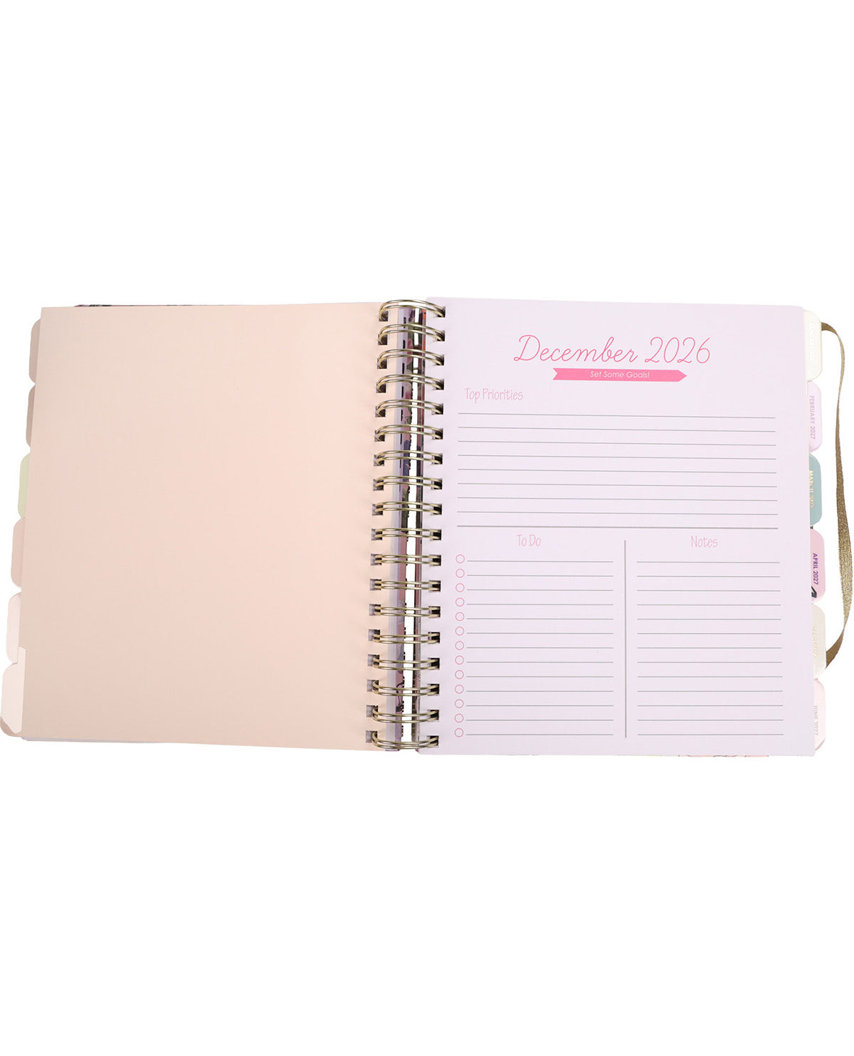 Pink planner with a strap on a white background